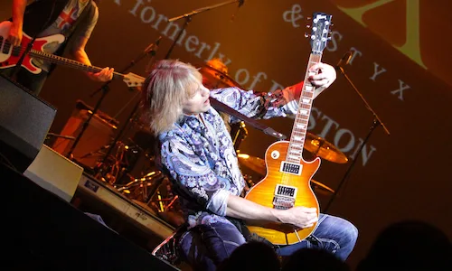 David Victor onstage with BOSTON